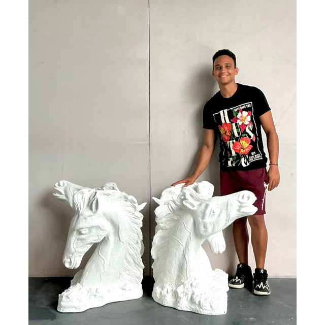 These monumental vintage table pedestals are a masterful expression of Hollywood Regency drama and Neoclassical flair....