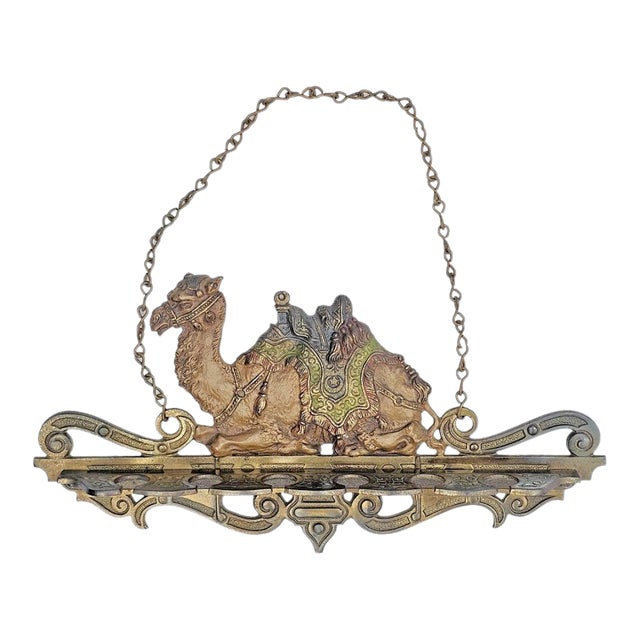 Antique 1910s Hanging Cast Iron Camel Pipe Rack by Cjo Judd For Sale