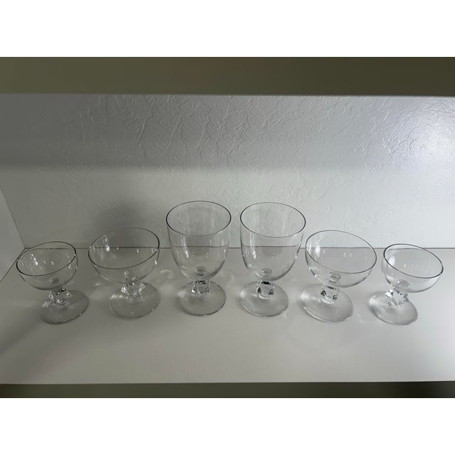 This set of six Bryce Aquarius liquor glasses reflects mid-century American crystal design characterized by architectural...