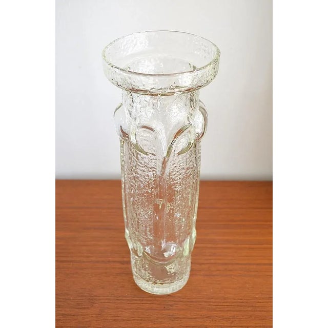 Vintage glass vase by Wayne Husted for the Italian company Stevia. The vase is with its ornaments typical for the designs...