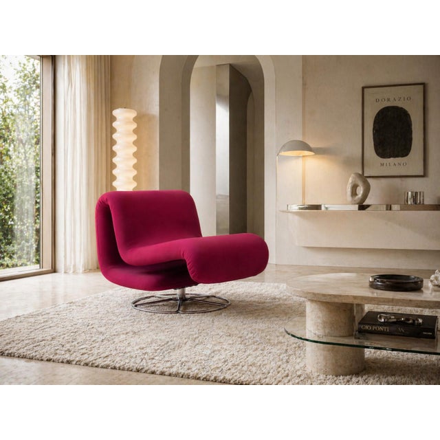 Vintage Sculptural Lounge Chair with Chrome Pedestal Base A striking vintage lounge chair with a bold sculptural profile...
