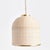 Woven in a natural cane rattan, with subtle variations in color making each one truly unique, this pendant is an instant...