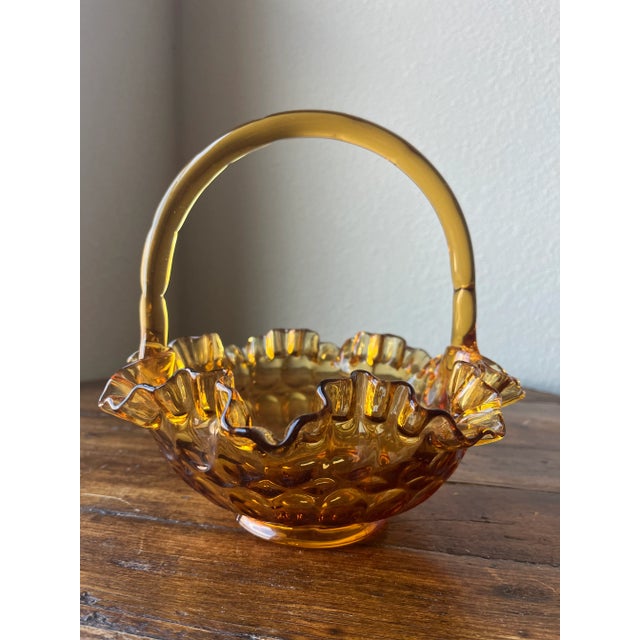 Fenton Glass Basket Vase Amber thumbprint pattern 8.5" width, 8" depth and 8" height No Chips nor cracks. Some Scratches...