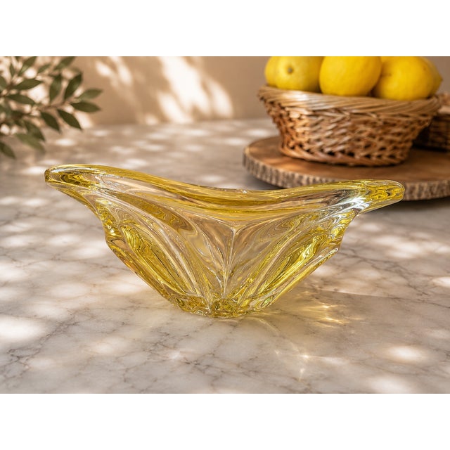 A breathtaking example of Mid-Century Czech art glass, this sculptural centerpiece captures light with remarkable depth,...