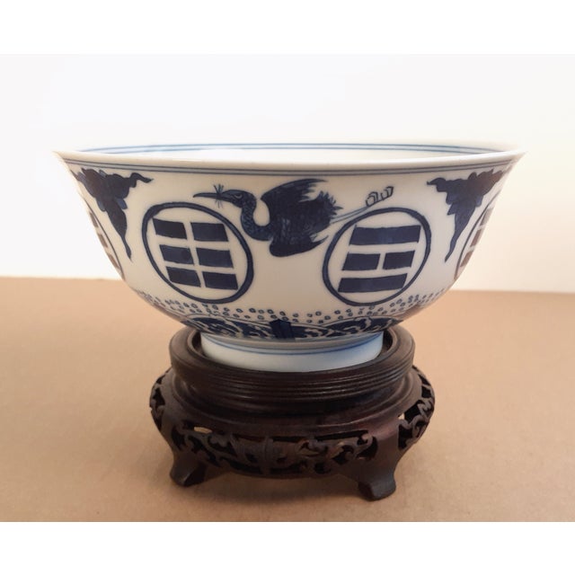 Chinese porcelain Bagua and cranes bowl, a finely potted, eggshell bowl in blue and white glazes. Both sides of the rim...