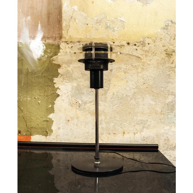 Table lamp with metal frame and acrylic glass details. Italian Production 80s European Plug (up to 250V).The wiring of...