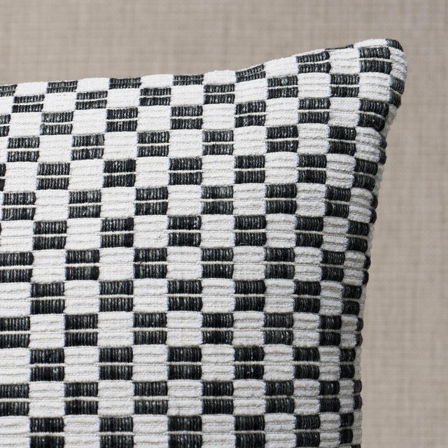 This pillow features Elkhart with a knife edge finish. Elkhart is a soft, artisanal small woven check with a wonderfully...