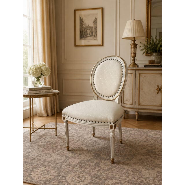 This elegant mid-20th century dining chair, crafted in the French Louis XVI style, features exquisite hand-carved...
