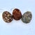 Set of three handcrafted feather ornaments. These are rustic, while providing a true natural element to the atmosphere....