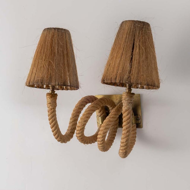 Unique Adrien Audoux and Frida Minet rope sconce from France, 1950s. Original curved rope with double arm lights and...
