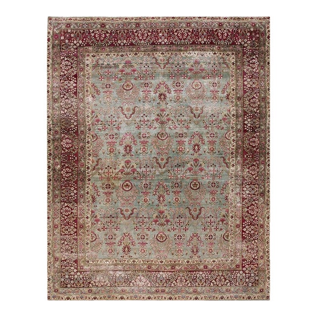 Beautiful Sky Blue Background Color With Floral Design in a Kirman Sytle Antique Persian Rug For Sale