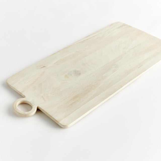 Made of a mango wood and finished in a lightWhitewash, this contemporary serving board is the perfect foundation for an...
