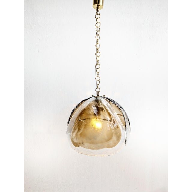 Flower shaped pendant lamp by famous German lighting manufacturer Kaiser Leuchten, 1970s. The lamp was constructed by...