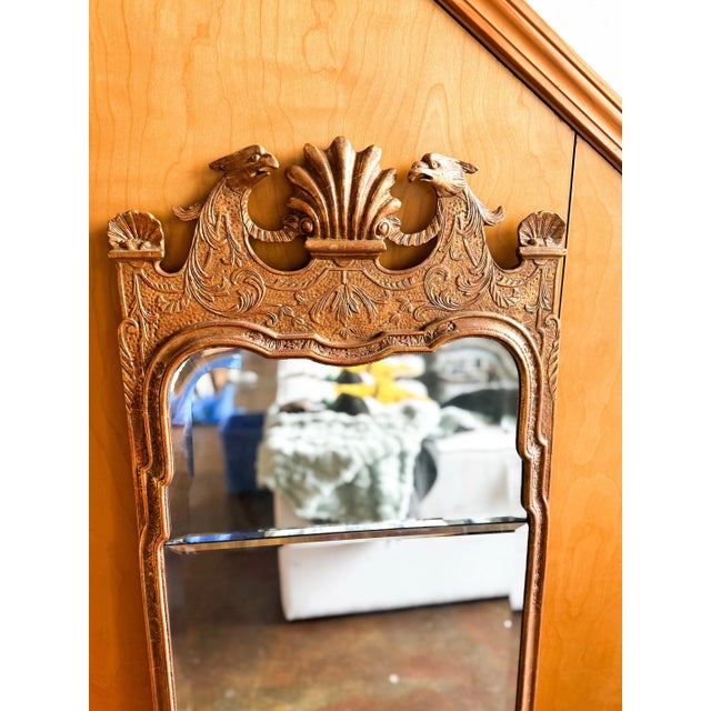 This mirror is Style No. 6657, a Queen Anne–style frame made by Mirror Fair in the 1990s. It was designed based on an...