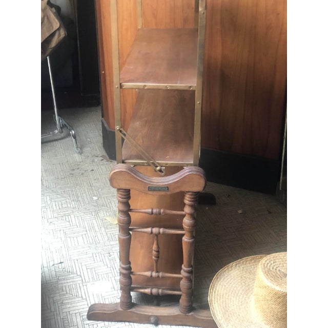 A multi-position shelving unit that collapses to become a merchandising table (or vice versa). The unique unit was...