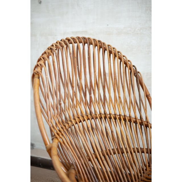 Pair of “tre cerchi” armchairs by tito agnoli for bonacina – italy – 1950s armchairs made entirely of bent rattan. The...