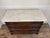 A beautifully restored American Renaissance Revival marble-top chest, believed to made between 1855-1875, showcasing the...