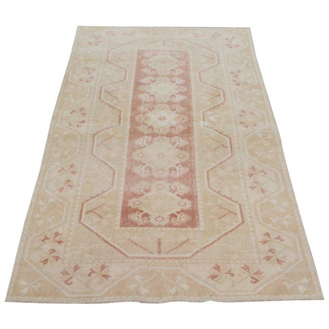 Hand-knotted with care using traditional rug-making techniques, this wool rug blends timeless craftsmanship with a modern...