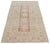 Hand-knotted with care using traditional rug-making techniques, this wool rug blends timeless craftsmanship with a modern...
