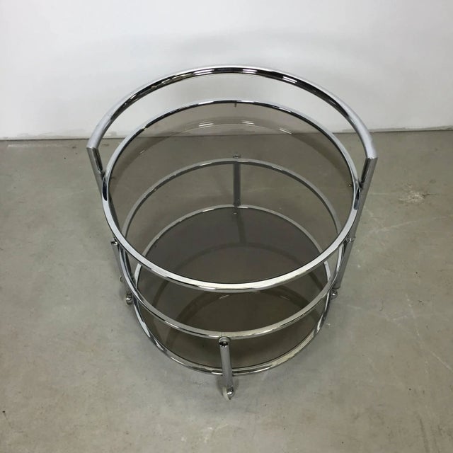 1970s expanding chrome and smoked glass bar on wheels.