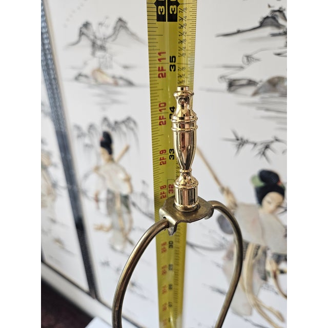 Very elegant Waterford "Marlow" lamp is vintage with sparkling crystal, a bright brass column and a black marble base with...