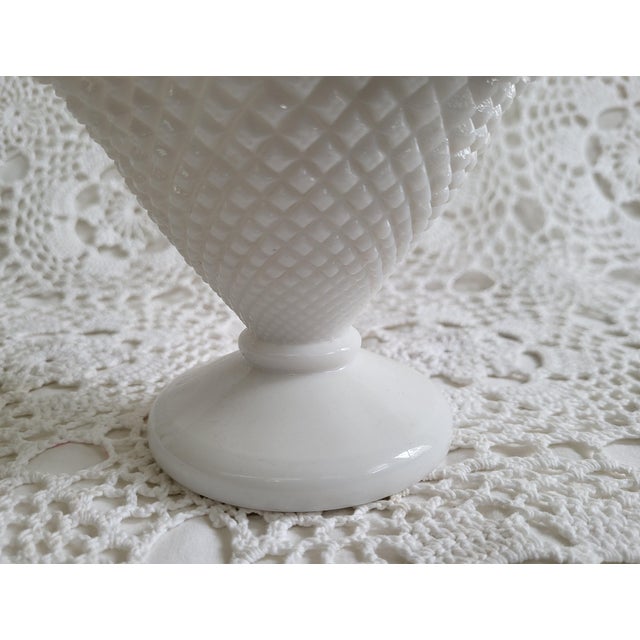 A small ruffled milk glass hobnail parfait bowl, measuring 4 ½” x 5 ¼” diameter x 3 ¼” base. This looks to be the 'diamond...