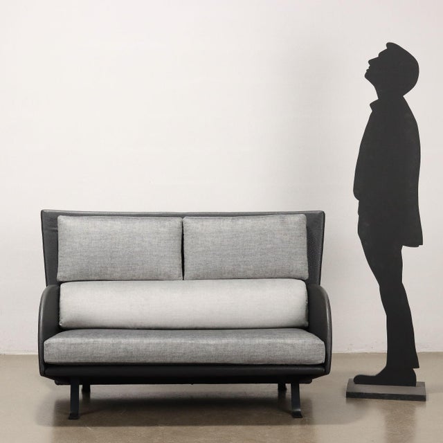 2-seater sofa, structure covered in imitation leather, foam cushions with velvet covering. Restored. This piece is...