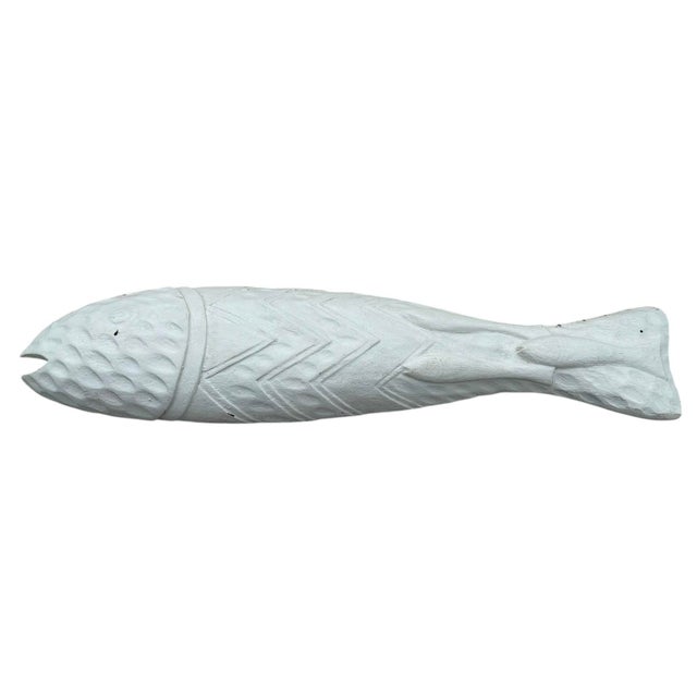 Bring authentic coastal character to your walls with this vintage hand-carved fish wall sculpture. Measuring over 31...
