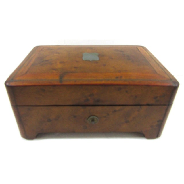 This antique 19th century Swiss cylinder music box features intricate wooden marquetry inlay and plays 4 songs. Handmade...