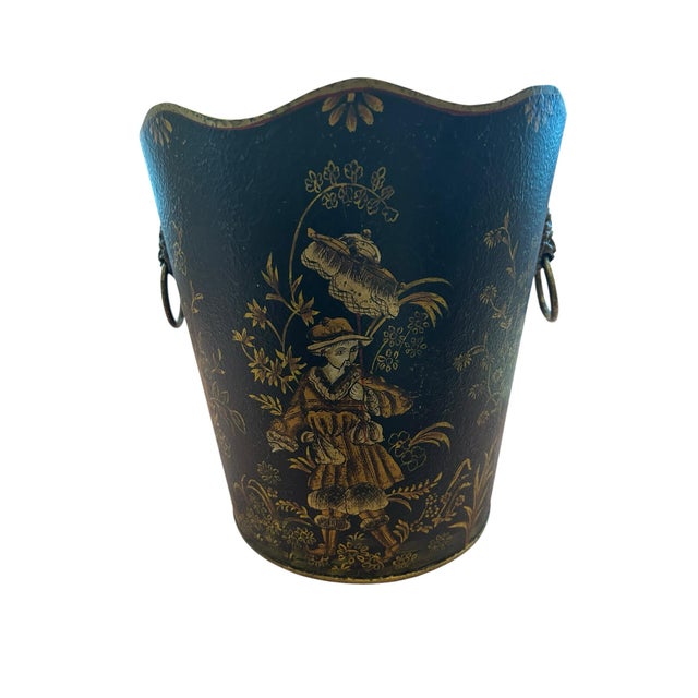 This wastebin is tole with a scalloped edge and lions head handles. The edges are trimmed in gold paint to match the...