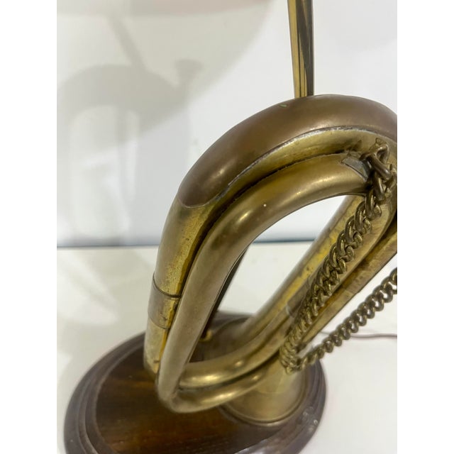 Add a touch of vintage character and musical charm to your space with this unique, brass bugle table lamp. Crafted from an...