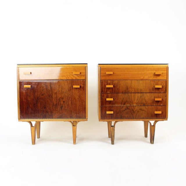 A beautiful pair of mid-century modern bedside tables produced in Czechoslovakia by Nový Domov, with original labels still...
