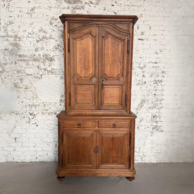 This rare 17th Century French chemist’s apothecary cabinet is a striking example of early pharmaceutical furniture, rich...