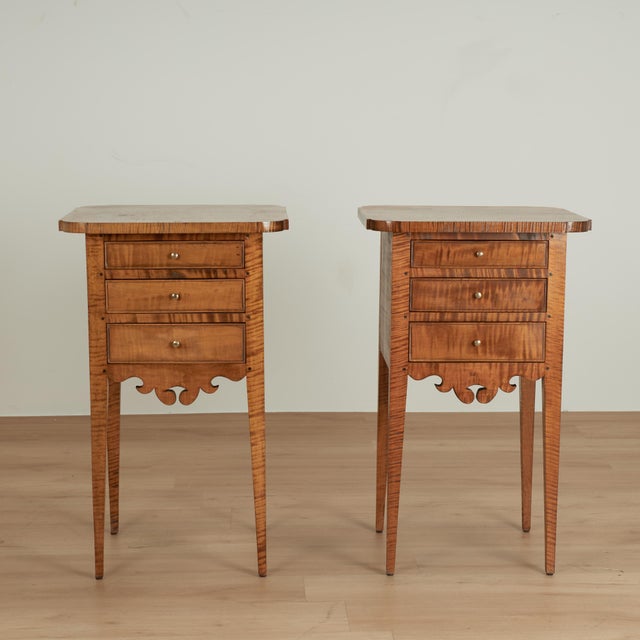 Handsome pair of early 20th century American stands handcrafted with a pegged construction in maple and tiger maple in...