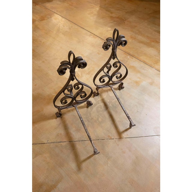 This elegant pair of 19th-century French andirons, dating to circa 1860, showcases the artistry and craftsmanship of the...
