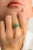 This is part of Chairish’s Fine Jewelry assortment. Natural Oval Emerald and Diamond Wedding Ring for Women in 14K Gold...