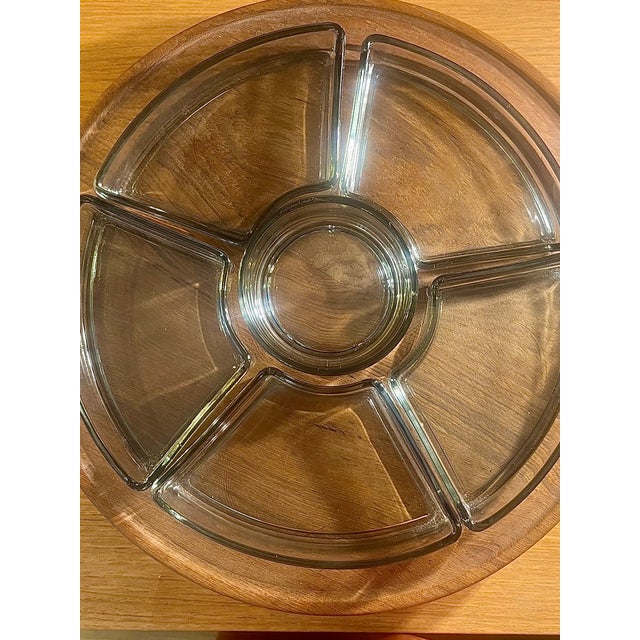 A rare and elegant rotating teak serving tray, attributed to Digsmed, the iconic Danish manufacturer of furniture and...
