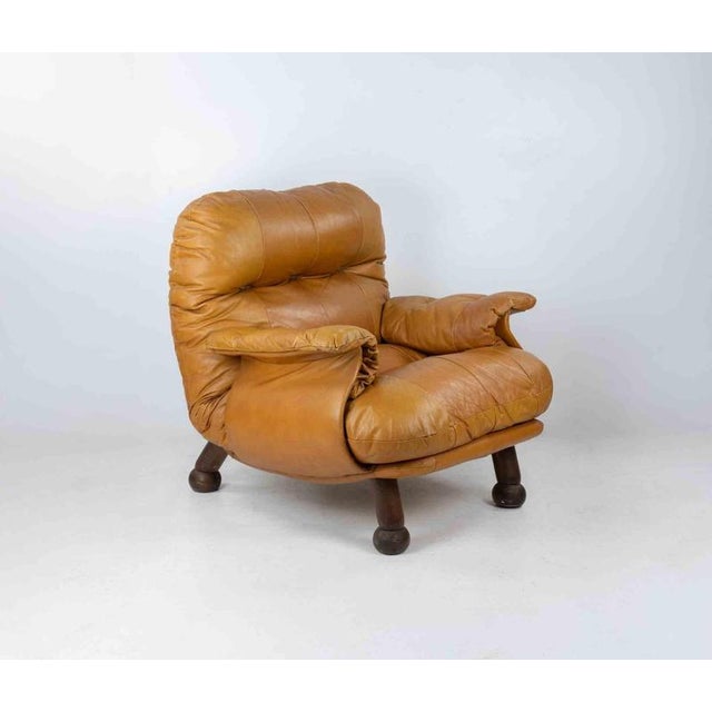 Vintage leather Armchair design by E. Cobianchi for INSA in 1970s. Original upholstery in very good condition. Seat height...