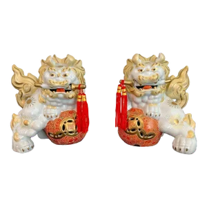 Mid 20th Century Gump’s Vintage Hand Painted Porcelain Foo Dogs - a Pair