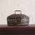 This 19th Century Belgian painted pine box showcases charming folk-art character through its intricate inlaid detailing...