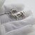 A vintage object depicting a miniature deer, crafted in Milan, Italy between the 1950s and 1960s in silver. The figure...