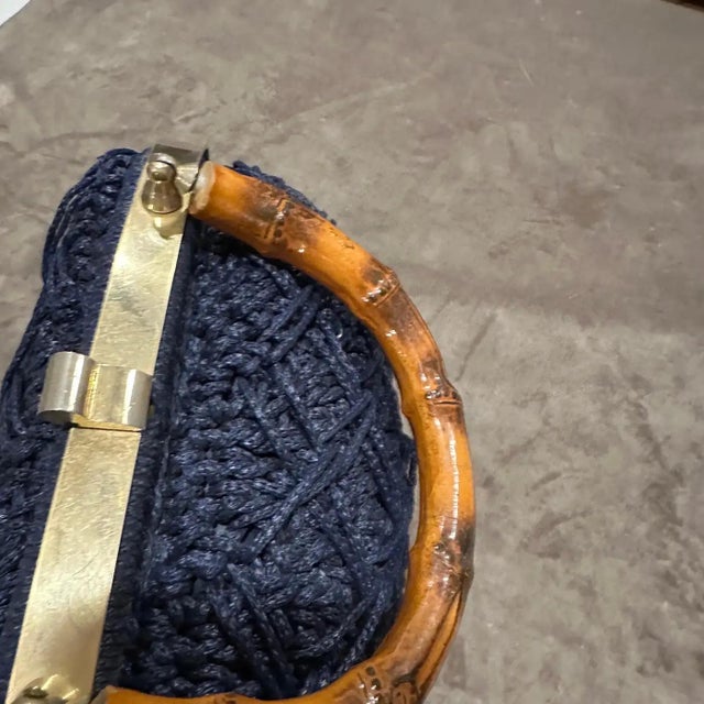 This vintage Italian handbag exudes a blend of rustic charm and refined craftsmanship, perfect for someone who appreciates...