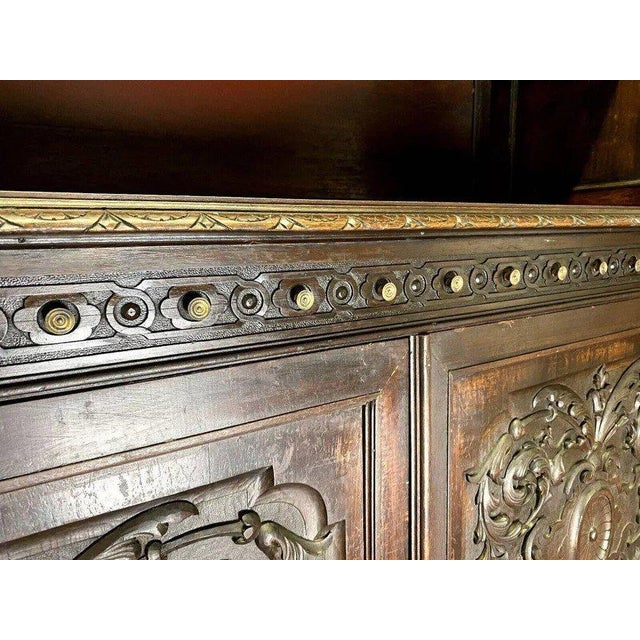 Renaissance-style sideboard, crafted entirely from walnut and richly carved. An imposing and decorative piece, ideal for...