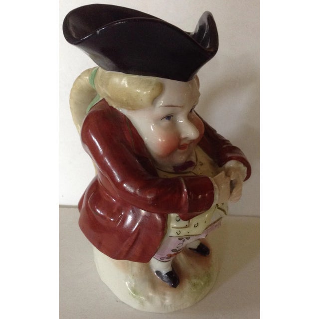 Toby jugs are best known as made by the English firm of Royal Doulton. This one is in that style but is of German make, as...