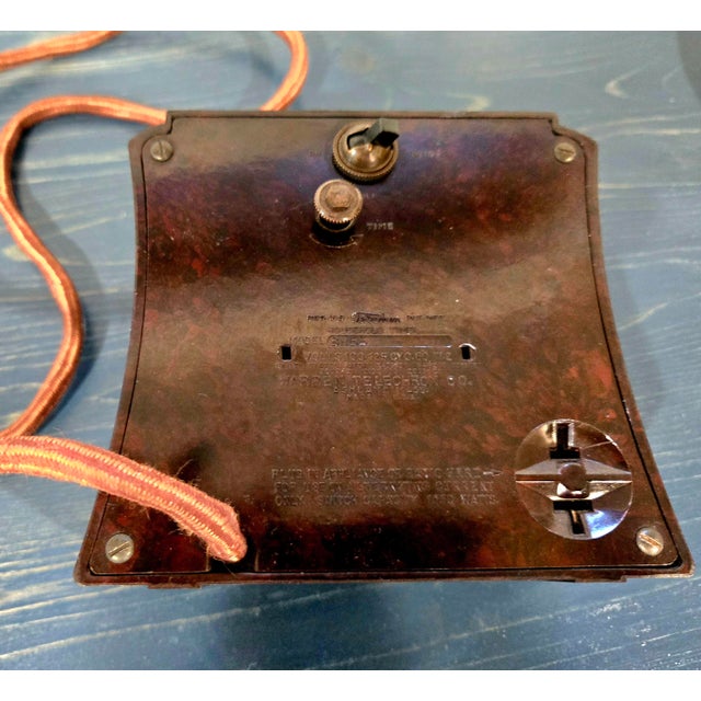 A rare and functional piece of mid-century industrial design, this 1940s Warren Telechron "Selector" (Model 8H55)...