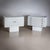 White commode with four drawers and a two-door sideboard on a square base, designed by Matteo Thun. The front panels...