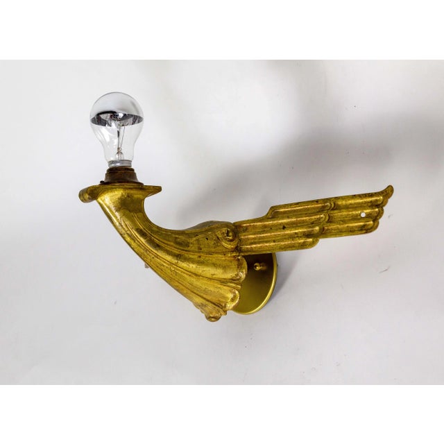 A pair of two sconces originally installed on columns of the historic, temple-like Fox Theater which opened in Oakland,...