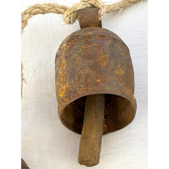 Metal Antique Six Primitive Cow Bells With Wood Clappers on a Rope For Sale - Image 7 of 12