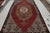 While the medallion design is the visual focal point of this hand-made vintage Turkish kilim rug, the bright gold...