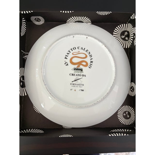 The Piatto Calendario is a continuing tradition that Piero Fornasetti began in 1968. Each year a new porcelain plate is...